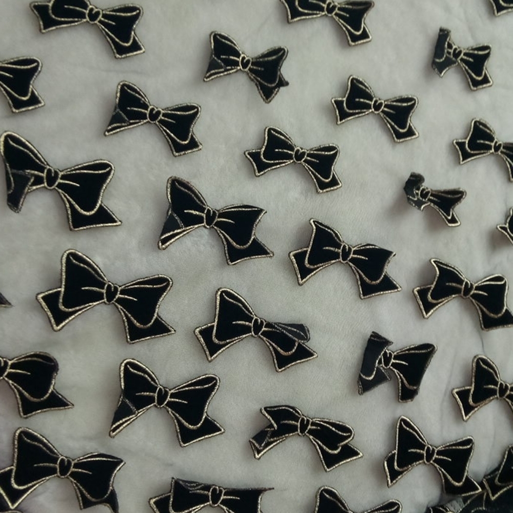 MARC JACOBS Designer Mesh Bow-Tie Fabric From MOOD - Picture 3 of 5